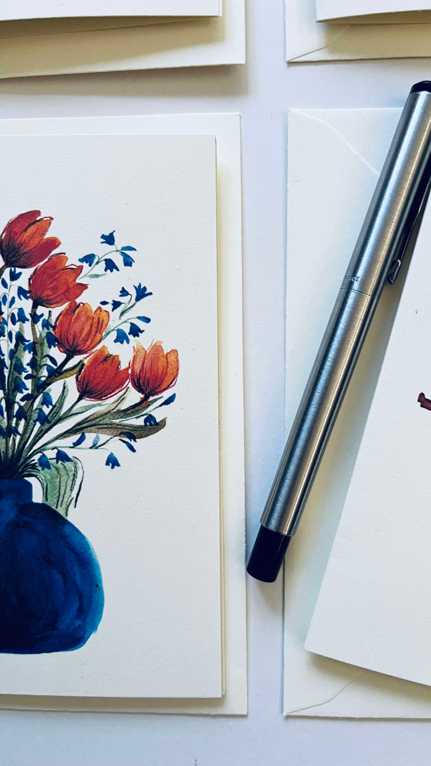 Orange Tulips and Bluebells in a Blue Vase | Greetings Card By Maria Zvaric Illustration